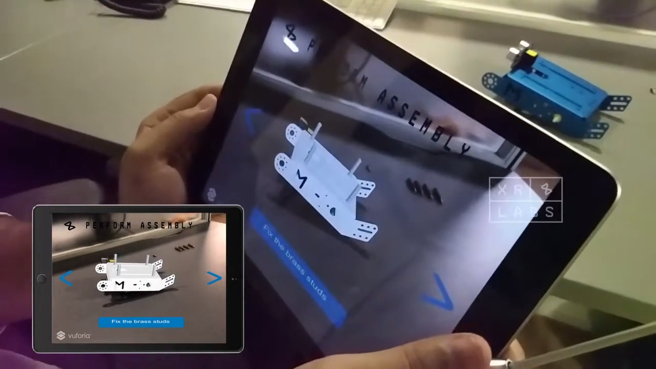 Building instructions are given by an AR App on a tablet